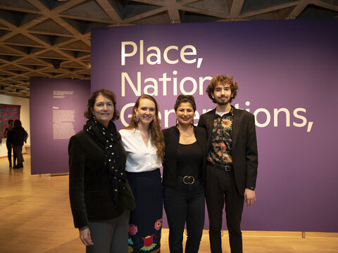 Gallery director with three of the students who curated the Place, Nations, Generations, Beings exhibition.