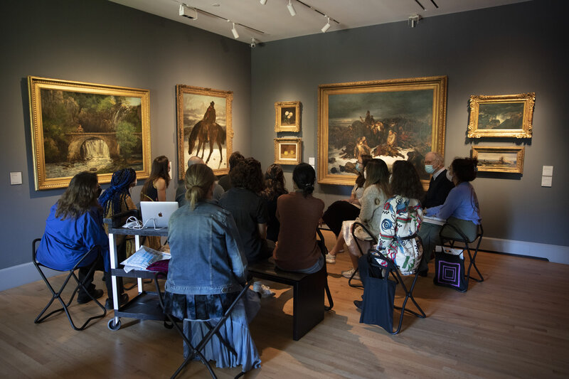 Yale grad students study paintings in the American art galleries.