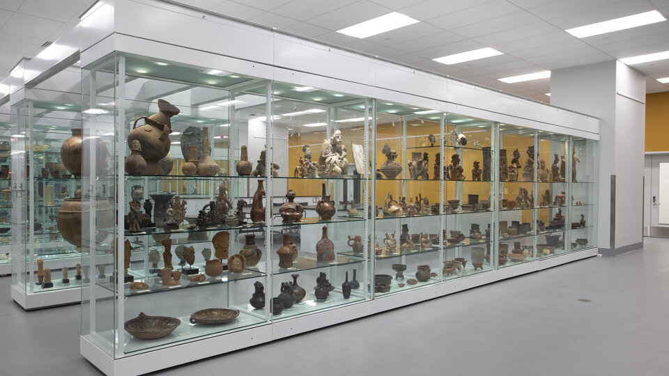 Objects displayed in tall, glass cases at the Wurtele Study Center.