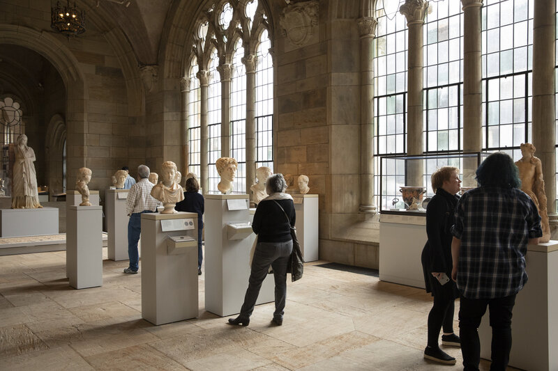 Visitors in the Ancient Art sculpture hall.