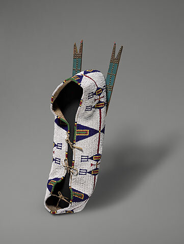 Artist Once Known (Lakota), Cradle, ca. 1880&ndash;1900. Deerskin, glass beads, and wood with brass. Yale Peabody Museum of Natural History, inv. no. YPM ANT.144819. Courtesy Yale Peabody Museum of Natural History